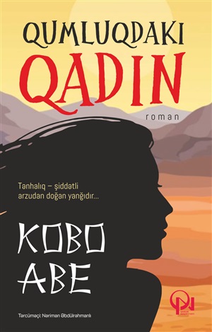 Qumluqdaki qadın